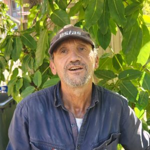 A photo of Tony Caridi, Maintenance Team Member at St Mark's College, Adelaide. Tony is standing in front of a tree.